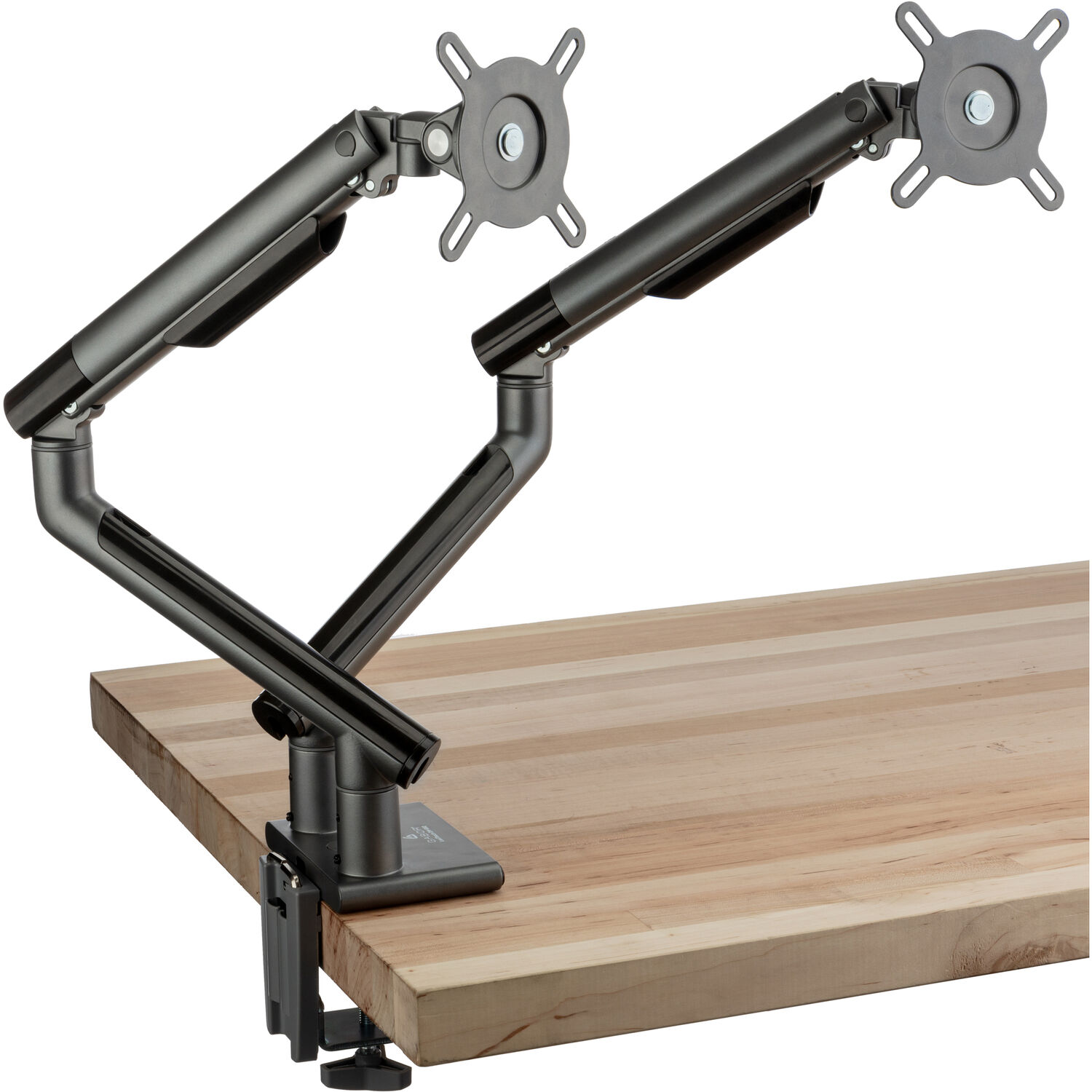 Gabor DM-552 dual articulating monitor arm clamped to a wood desk