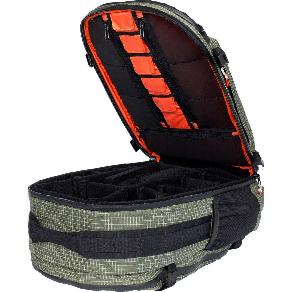 Poler Orange Label Camera Backpack lying open showing padded dividers and orange interior lid pockets